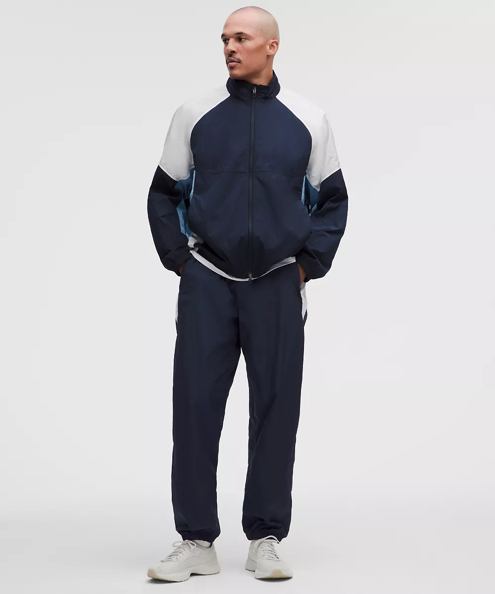 Pantalon de survêtement en nylon coupe décontractée *Regular — Club Blue/White, view 1